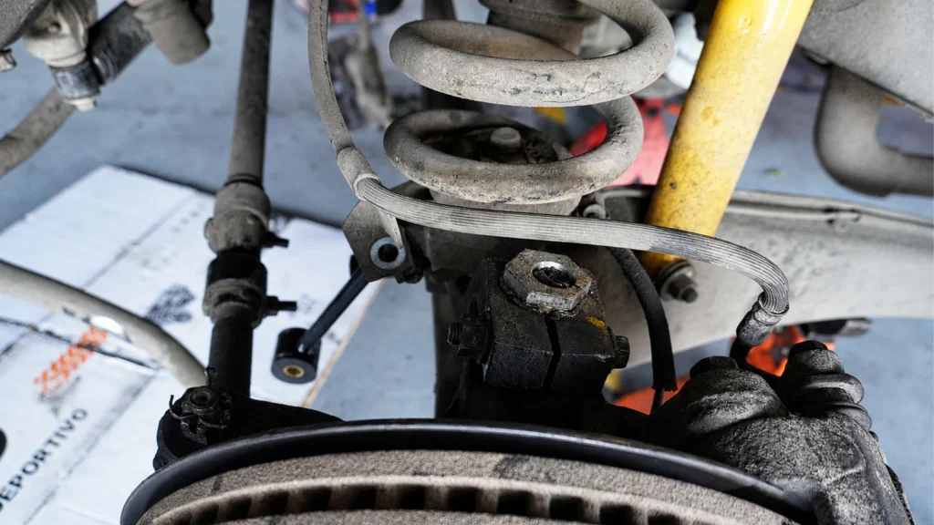 partes del sistema de frenos con disco suspension y mangueras